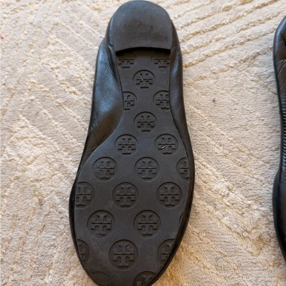 Tory Burch Black Flats with Gold Emblem - Picture 2 of 5
